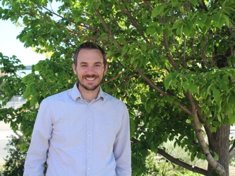 John Murgel, CSU Extension Specialist in Douglas County, standing in front of a tree. 