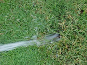 Figure 6: This sprinkler head is not parallel to the slope.
