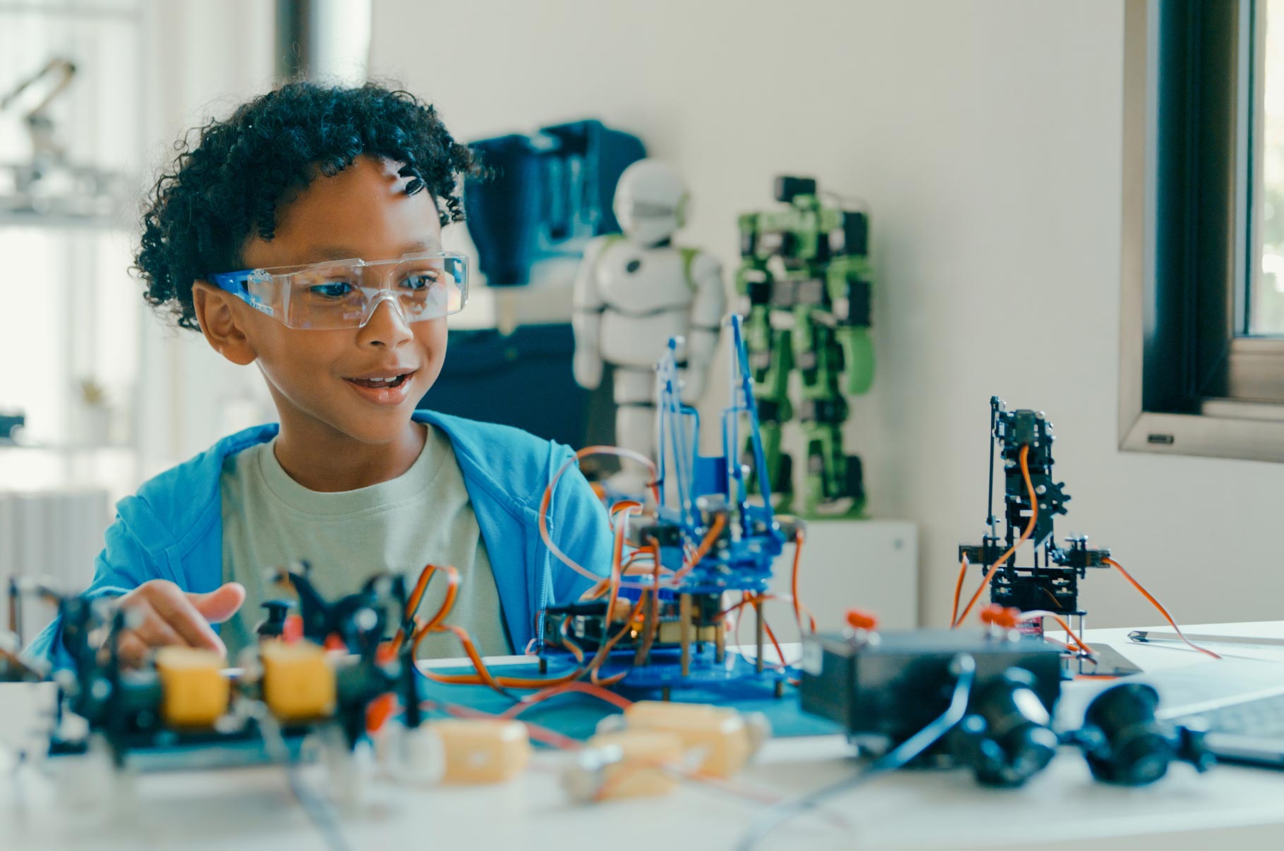 A child works on a science project at home