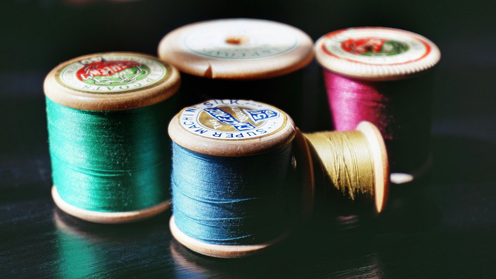 Spools of colorful sewing thread