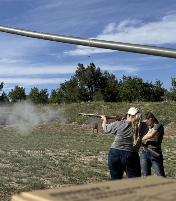 Shylynn Larrick (left) and Arisa Eicher (right) at the Muzzleloading contest