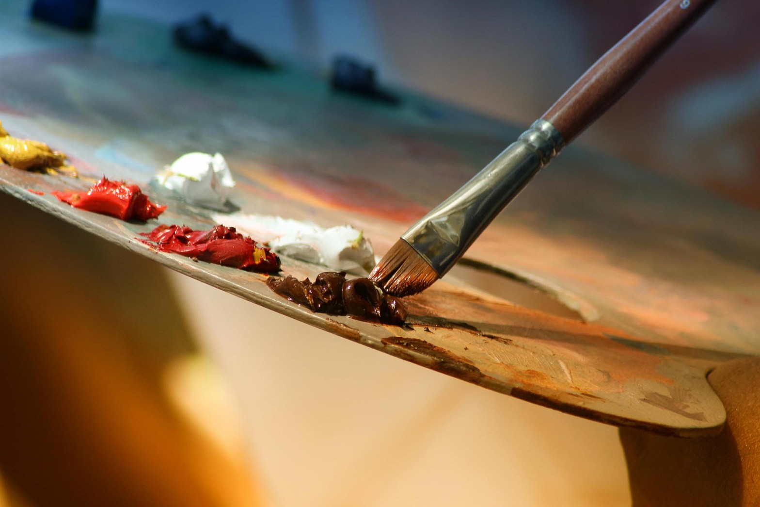 Closeup of a painter's palette and brush