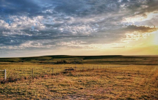 Open plains with clouds above