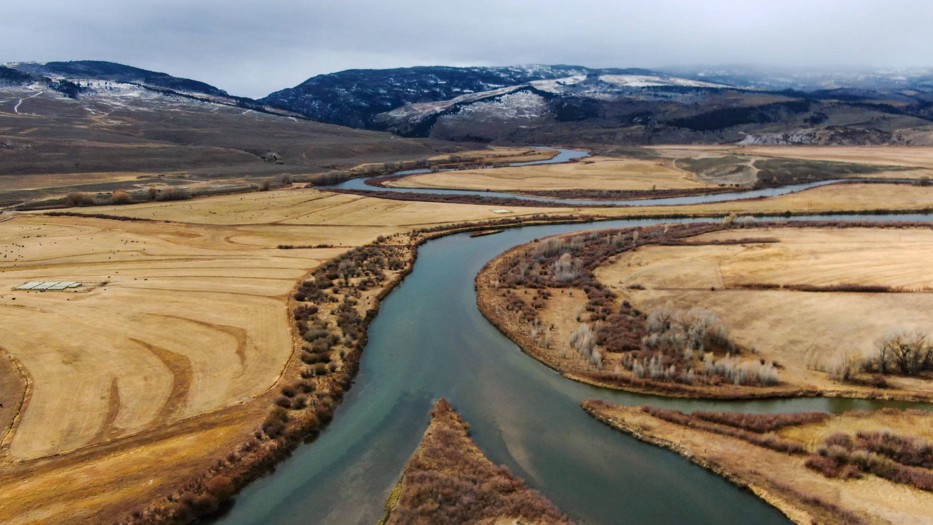 Colorado river confluence with mountain in background