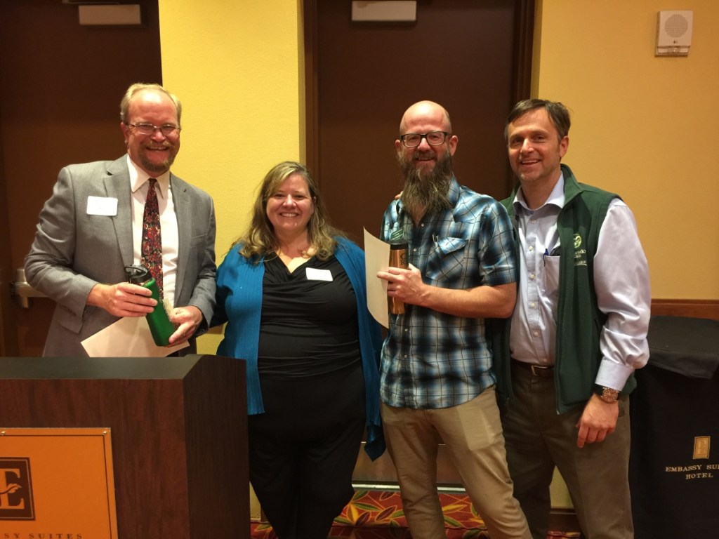 A group of people pose for the camera at a CBF event