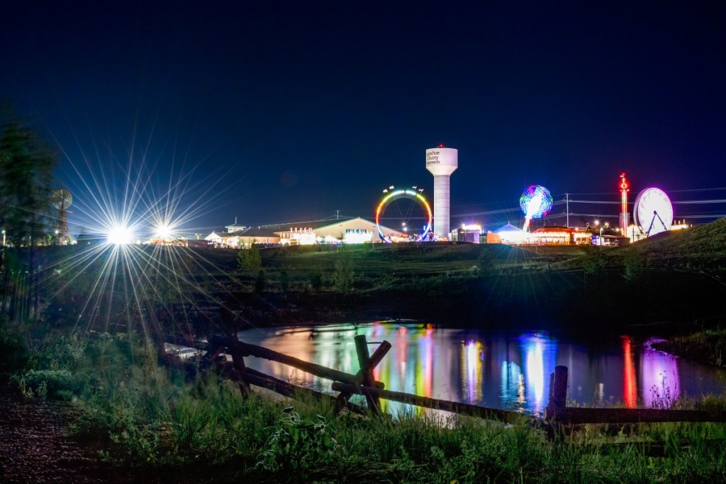 Scenic view of the Arapahoe County Fair at night.