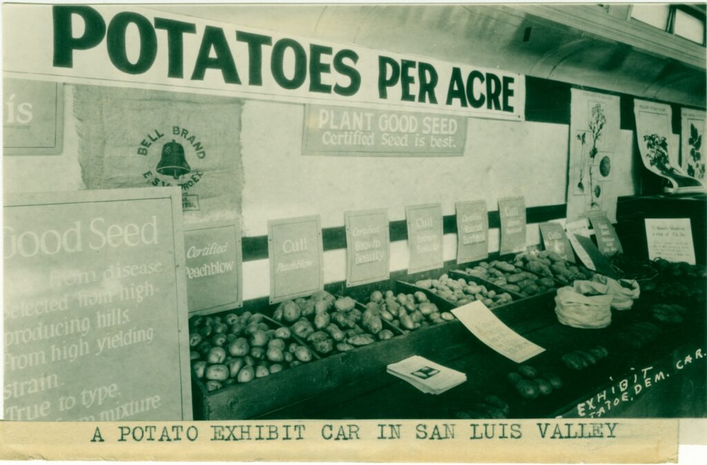 Interior of a train car with displays focused on potatoes.